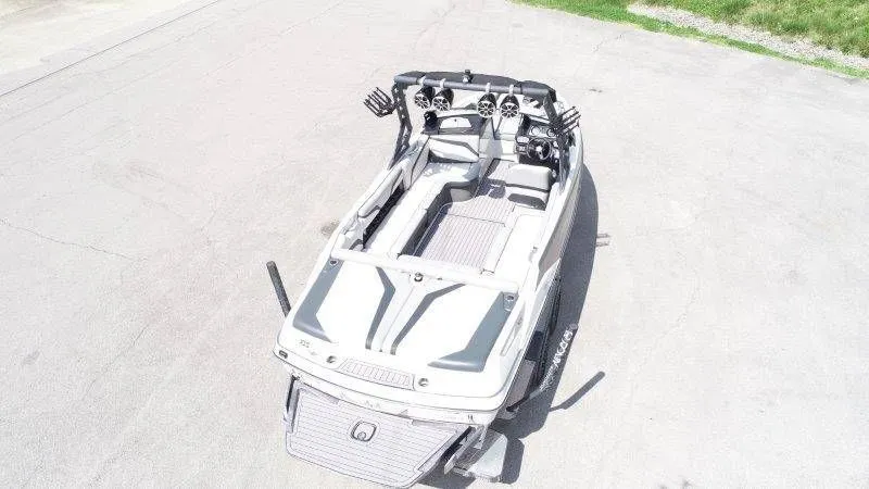 Slide: The Image of Aerial view of a 2017 Axis T23 boat on asphalt. - 8