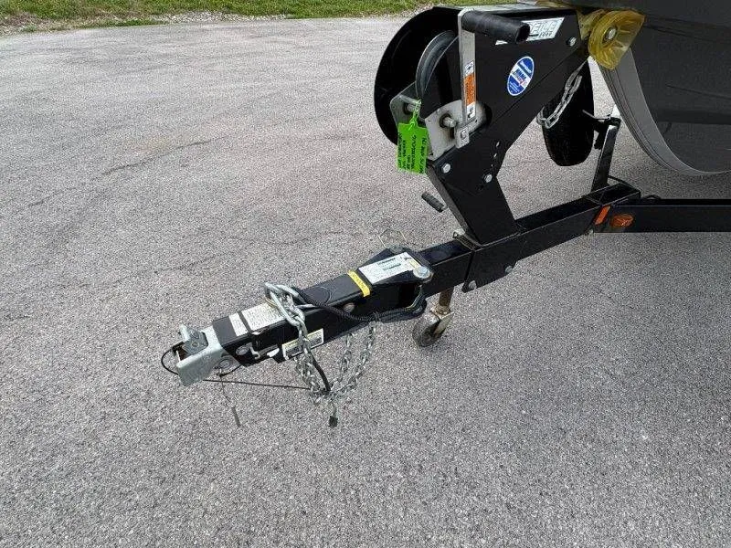 Slide: The Image of Trailer of a 2016 Yamaha AR240 boat on asphalt. - 19