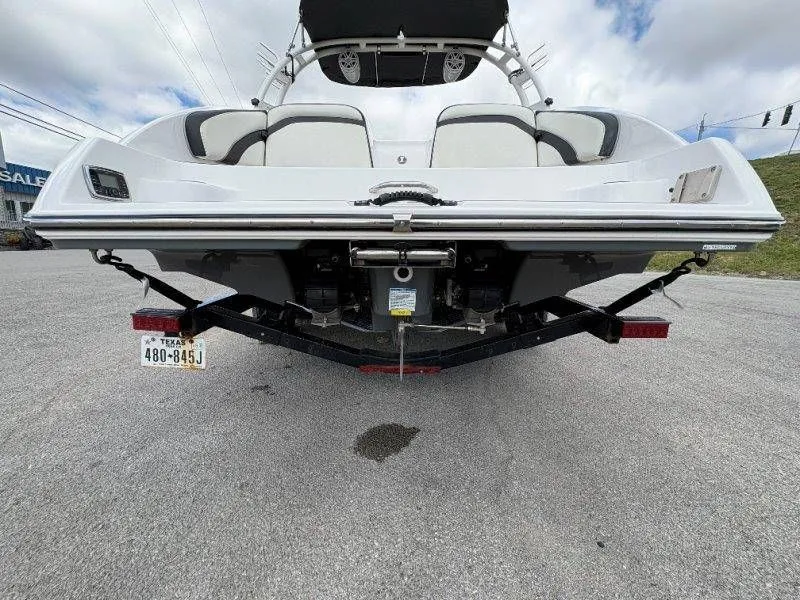 Slide: The Image of Rear view of a 2016 Yamaha AR240 boat on a trailer. - 20