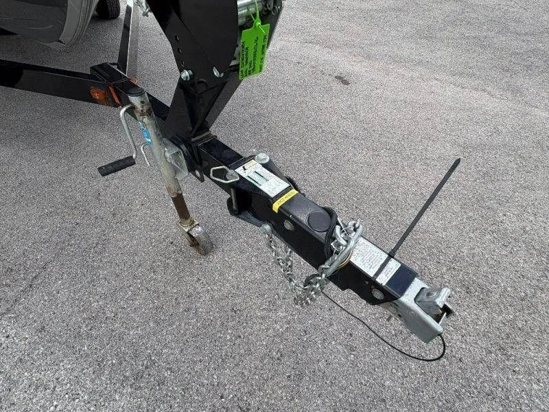 Slide: The Image of Trailer hitch of a 2016 Yamaha Boats AR240 on asphalt. - 21