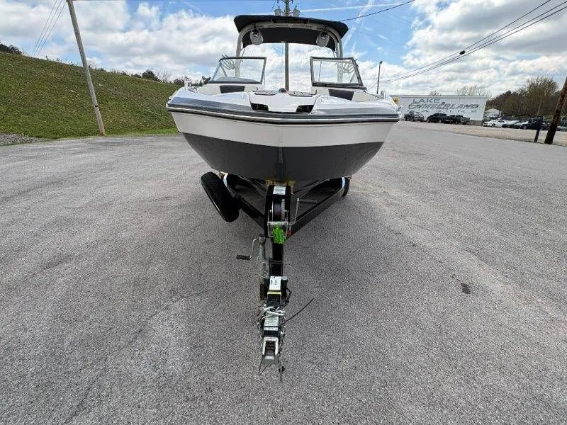 Slide: The Image of 2016 Yamaha AR240 boat on trailer, front view in parking lot. - 22