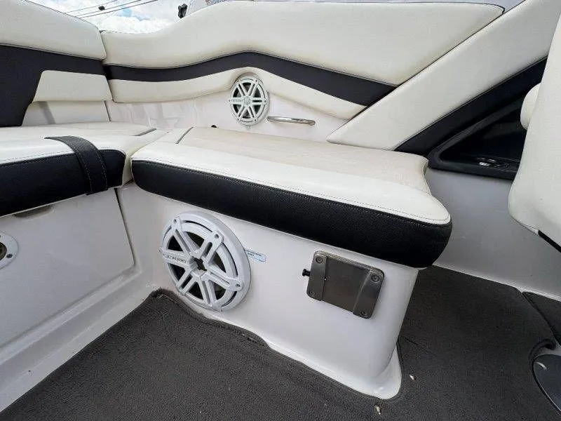 Slide: The Image of Interior of a 2016 Yamaha AR240 boat with speakers. - 30