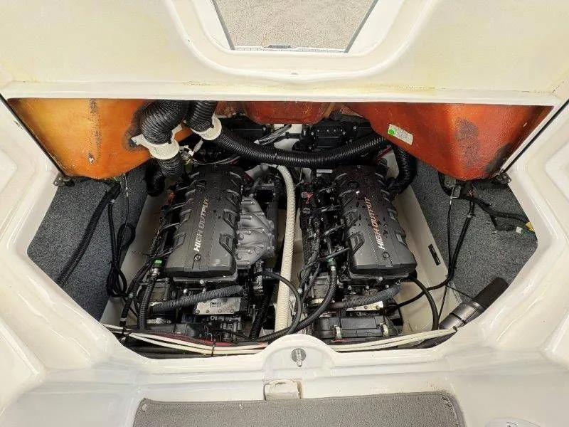 Slide: The Image of Engine compartment of a 2016 Yamaha AR240 boat with dual engines. - 35