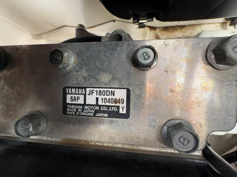 Slide: The Image of Close-up of a Yamaha AR240 2016 engine part with serial number. - 36