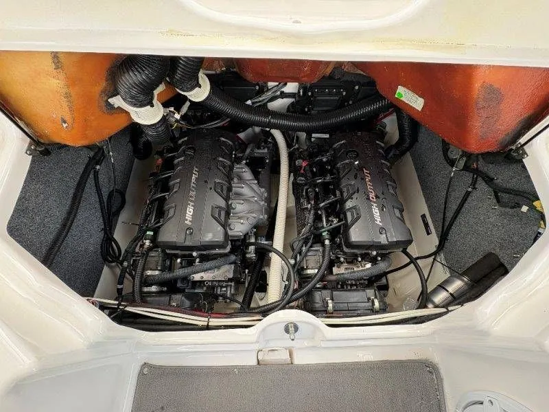 Slide: The Image of Engine compartment of a 2016 Yamaha AR240 boat with dual high-output engines. - 38