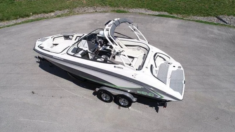 Slide: The Image of Aerial view of a 2016 Yamaha AR240 boat on a trailer. - 4