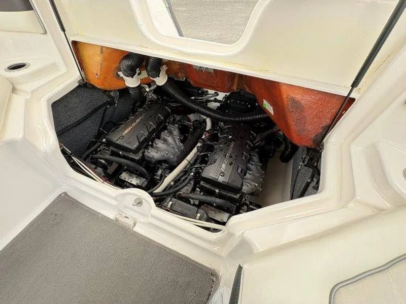 Slide: The Image of Engine compartment of a 2016 Yamaha AR240 boat with dual engines. - 42