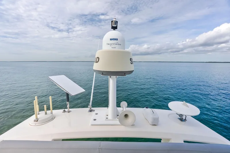 Slide: The Image of 2018 Ferretti Yachts 550 with advanced navigation equipment on open sea. - 35