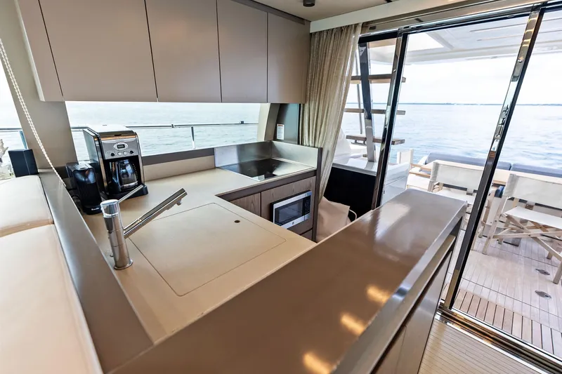 Slide: The Image of Luxurious kitchen interior of 2018 Ferretti Yachts 550 with ocean view. - 47
