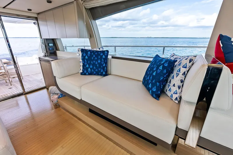 Slide: The Image of Luxurious interior of 2018 Ferretti Yachts 550 with elegant seating and ocean view. - 56