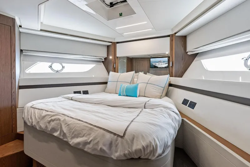 Slide: The Image of Luxurious bedroom interior of 2018 Ferretti Yachts 550 with elegant bedding and modern design. - 70