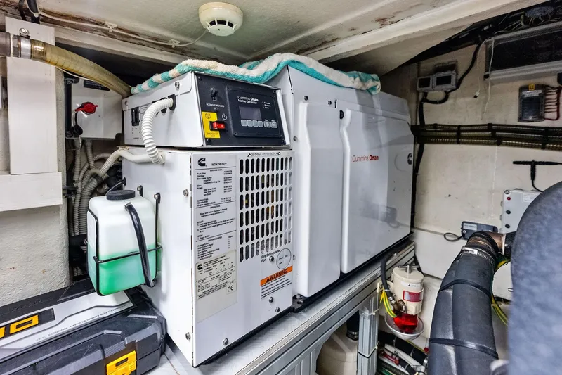 Slide: The Image of Engine room of 2018 Ferretti Yachts 550 featuring Cummins Onan generator. - 79