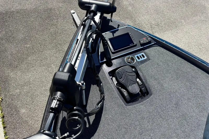 Slide: The Image of 2025 Ranger Z520R boat deck with trolling motor and navigation controls. - 3