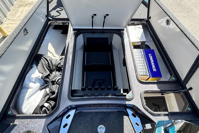 Slide: The Image of Interior view of 2025 Ranger Z520R with storage and Lowrance equipment. - 5