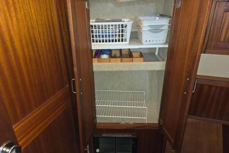 Slide: The Image of Interior storage cabinet on 2009 American Tug 34 Rare Flybridge Model yacht. - 58