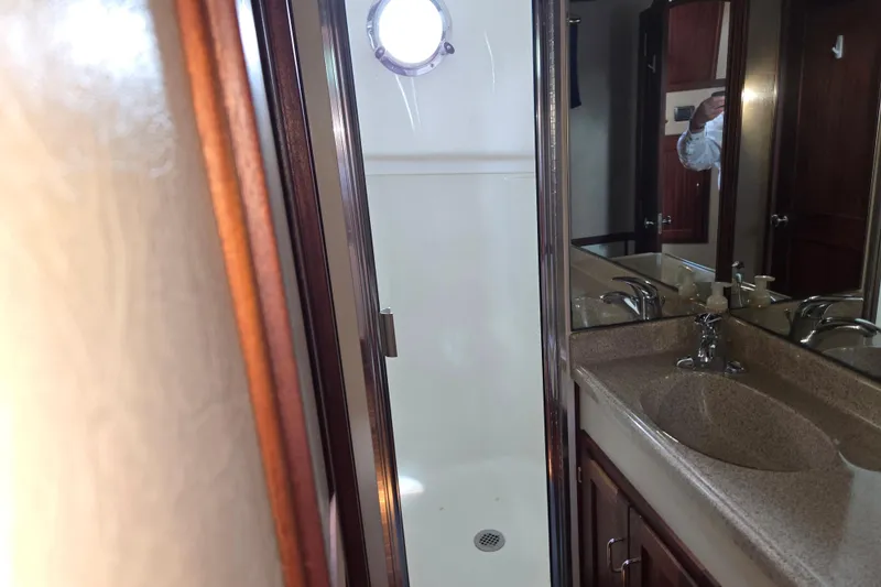 Slide: The Image of Bathroom interior of 2009 American Tug 34 Rare Flybridge Model with shower and sink. - 65