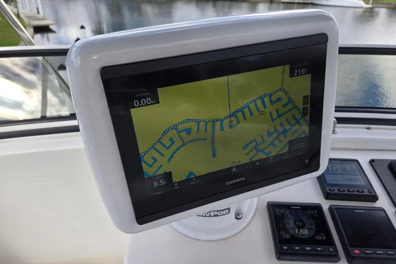 Slide: The Image of Garmin navigation display on 2009 American Tug 34 Rare Flybridge Model, showing waterway map. - 69