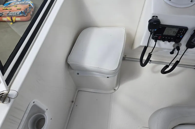 Slide: The Image of 2009 American Tug 34 Rare Flybridge Model interior with radio equipment and seating. - 75
