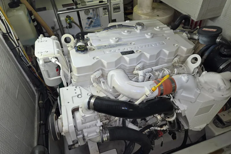 Slide: The Image of Engine room of 2009 American Tug 34 Rare Flybridge Model, featuring a Cummins engine. - 82