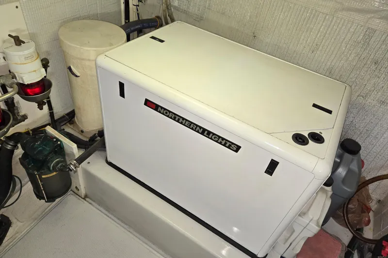 Slide: The Image of Engine room of 2009 American Tug 34 Rare Flybridge Model with Northern Lights generator. - 87