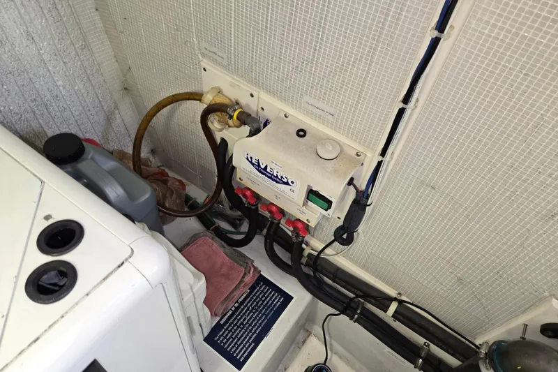 Slide: The Image of Engine room of 2009 American Tug 34 Rare Flybridge Model with mechanical components. - 88