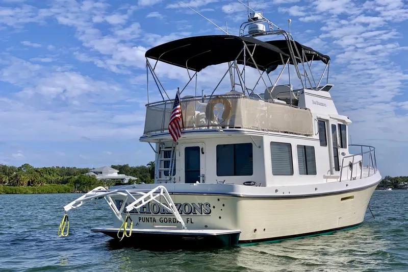 Slide: The Image of 2009 American Tug 34 Rare Flybridge Model on water, Punta Gorda, FL. - 99