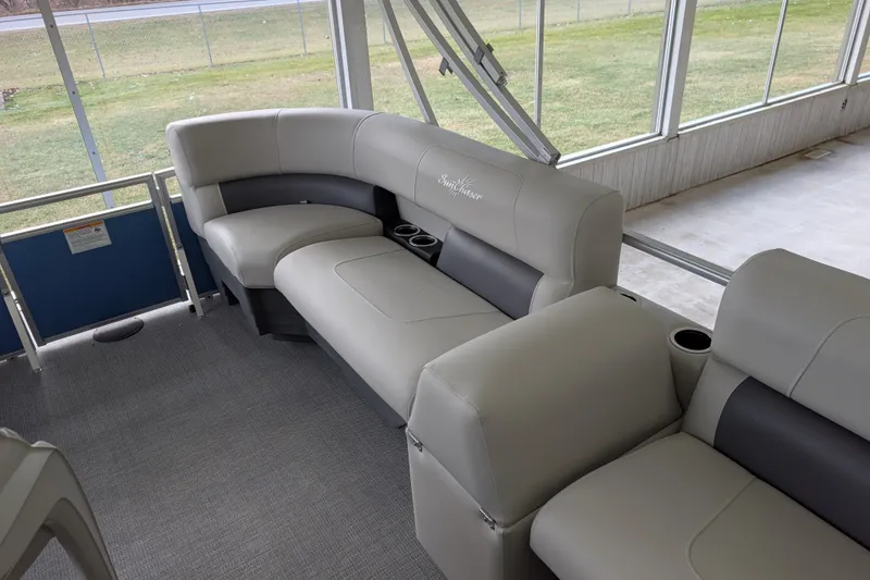 Slide: The Image of Interior of 2026 SunChaser Vista 16 LR with gray leather seating. - 7
