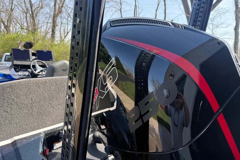 Slide: The Image of 2024 Vexus VXs20 boat engine with 250 XS branding, sleek design, and modern dashboard. - 13