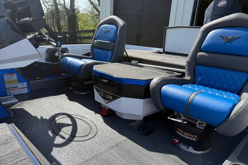 Slide: The Image of 2024 Vexus VXs20 boat interior with blue seats and AirWave pedestal. - 7