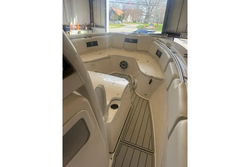 Slide: The Image of 2024 Sea Fox 288 Commander boat interior with seating and storage compartments. - 9