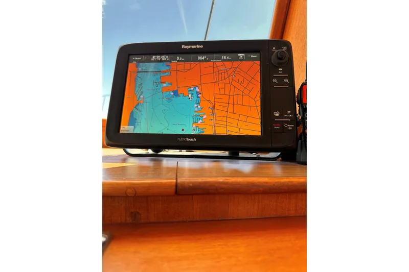 Slide: The Image of Raymarine navigation display on 1994 Grand Banks 42 Classic yacht dashboard. - 23