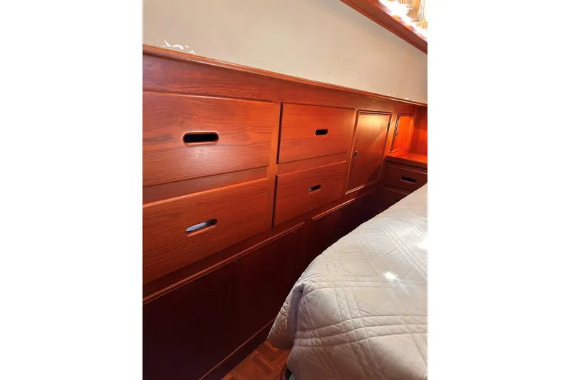 Slide: The Image of Wooden cabinetry in a 1994 Grand Banks 42 Classic yacht interior. - 29
