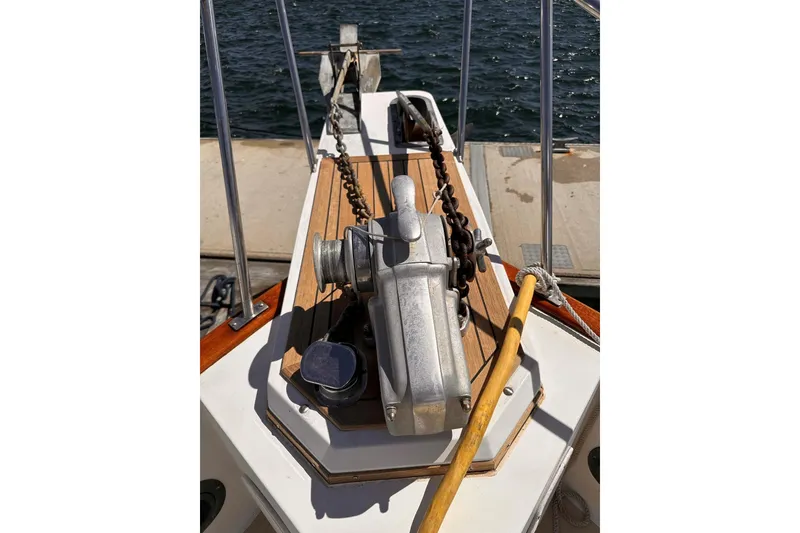 Slide: The Image of Anchor windlass on 1994 Grand Banks 42 Classic yacht deck. - 9