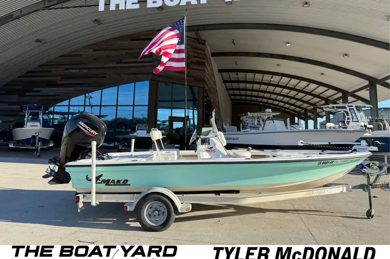 The Image of 2010 Mako 18 LTS boat with American flag at The Boat Yard. - 1