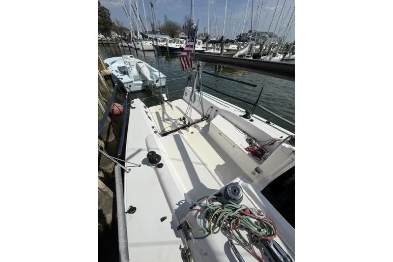 Slide: The Image of 2015 J Boats J/88 sailboat docked, showcasing deck and rigging details. - 10