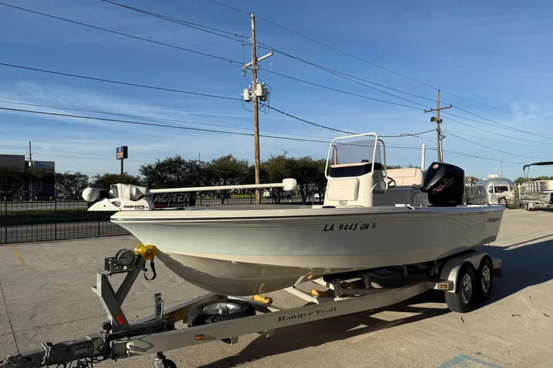Slide: The Image of 2021 Ranger 2260 Bay Ranger boat on trailer in parking lot. - 4