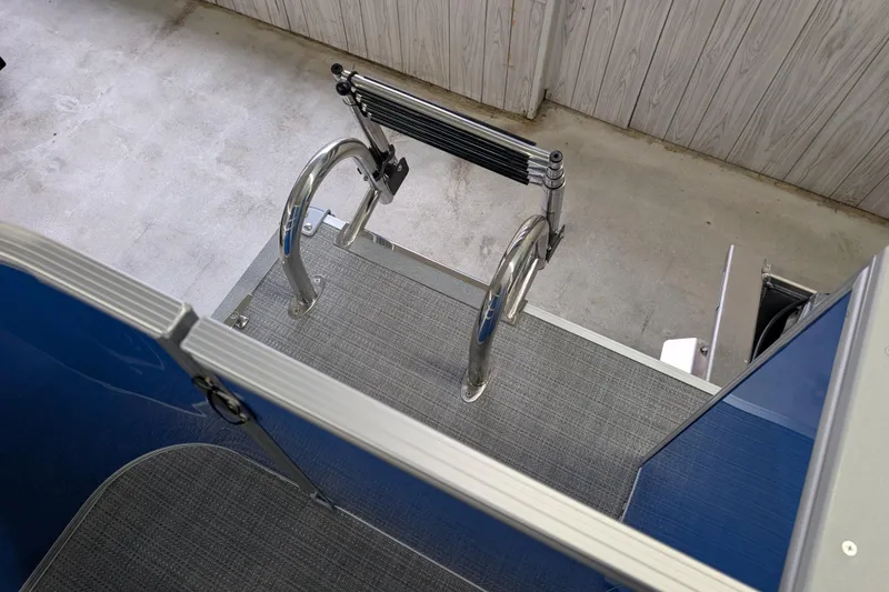 Slide: The Image of 2026 Sylvan Mirage Fish 8522 Party Fish boat ladder and deck area. - 11