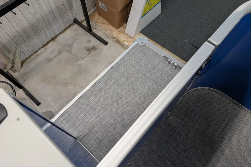 Slide: The Image of Interior view of 2026 Sylvan Mirage Fish 8522 Party Fish boat, showcasing flooring and railing. - 12