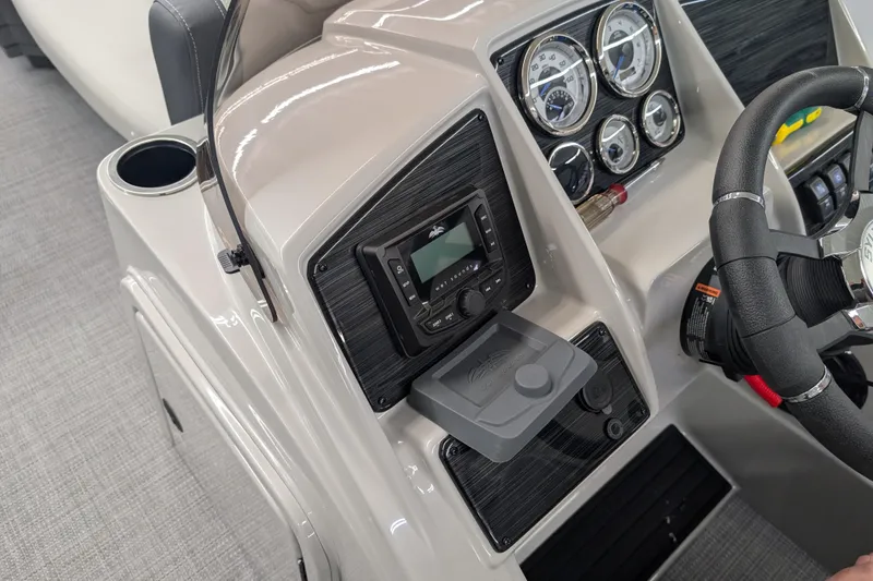 Slide: The Image of 2026 Sylvan Mirage Fish 8522 Party Fish dashboard with steering wheel and control panel. - 3