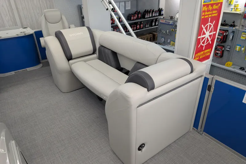 Slide: The Image of Luxurious seating on 2026 Sylvan Mirage Fish 8522 Party Fish boat in showroom. - 7