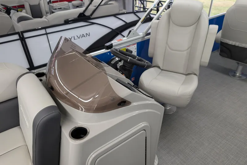 Slide: The Image of Interior of 2026 Sylvan Mirage Fish 8522 Party Fish boat with steering console and seating. - 8