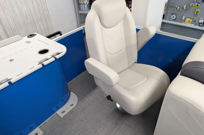Slide: The Image of 2026 Sylvan Mirage Fish 8522 Party Fish boat interior with white captain's chair. - 9