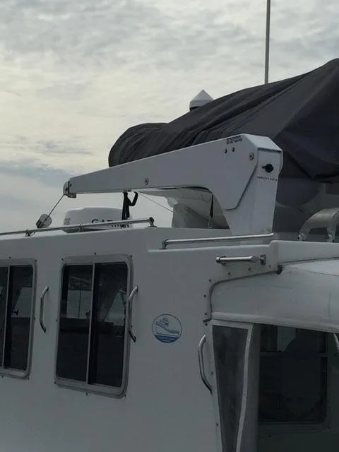 Slide: The Image of 2000 Provincial 42 Pleasure Boat with cover and crane. - 10