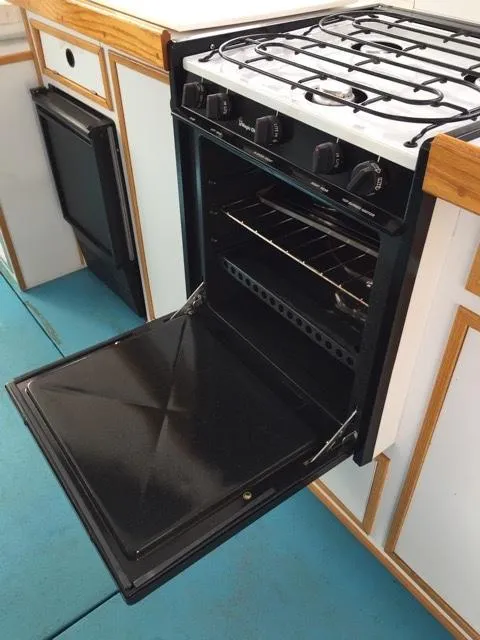 Slide: The Image of Open oven in a 2000 Provincial 42 yacht kitchen. - 31