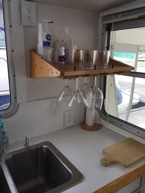 Slide: The Image of Kitchen area on a 2000 Provincial 42 Pleasure Boat. - 35