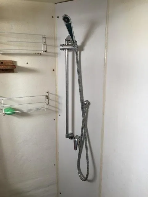 Slide: The Image of Shower in a 2000 Provincial 42 Pleasure Boat. - 37