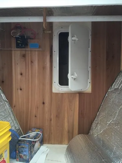 Slide: The Image of Interior of a 2000 Provincial 42 Pleasure Boat with wood paneling. - 43