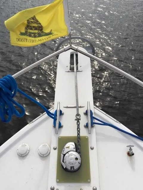 Slide: The Image of Bow of a Provincial 42 boat with flag and anchor chain. - 6