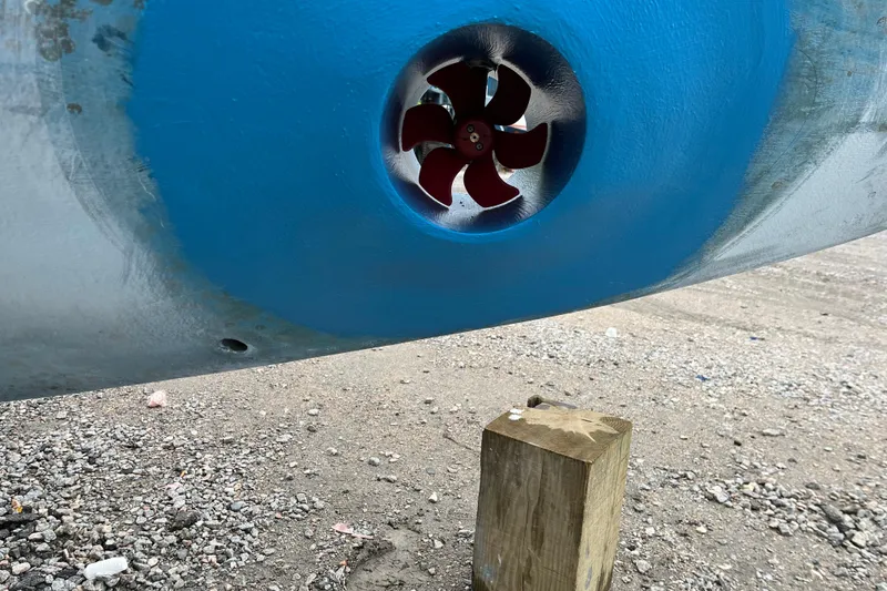 Slide: The Image of Close-up of a Provincial 42 Pleasure Boat's bow thruster, 2000 model, on a gravel surface. - 65