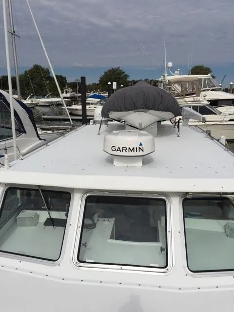 Slide: The Image of 2000 Provincial 42 Pleasure Boat docked with Garmin equipment. - 7